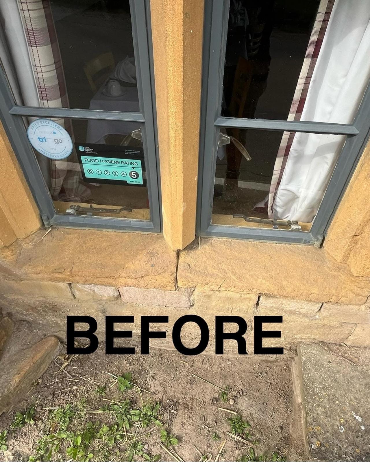 Eroded stone window cill and mullion, weathered back with open joints